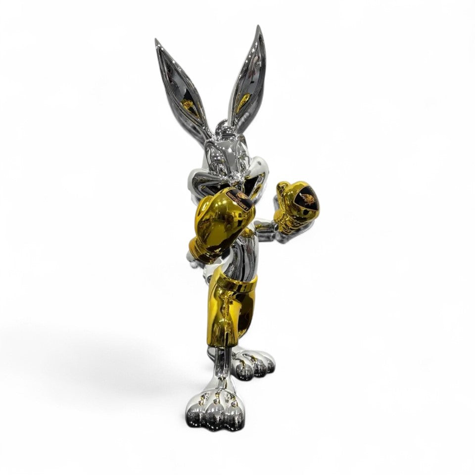 A single green leaf against a white background.